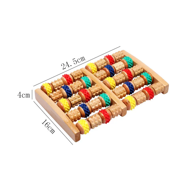 Wooden six-row roller foot massager for acupoint hand massage on a flat surface