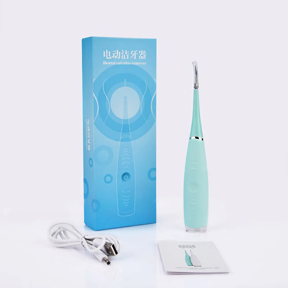 Electric dental scaler with USB rechargeable base, pink colour, compact design for home calculus removal