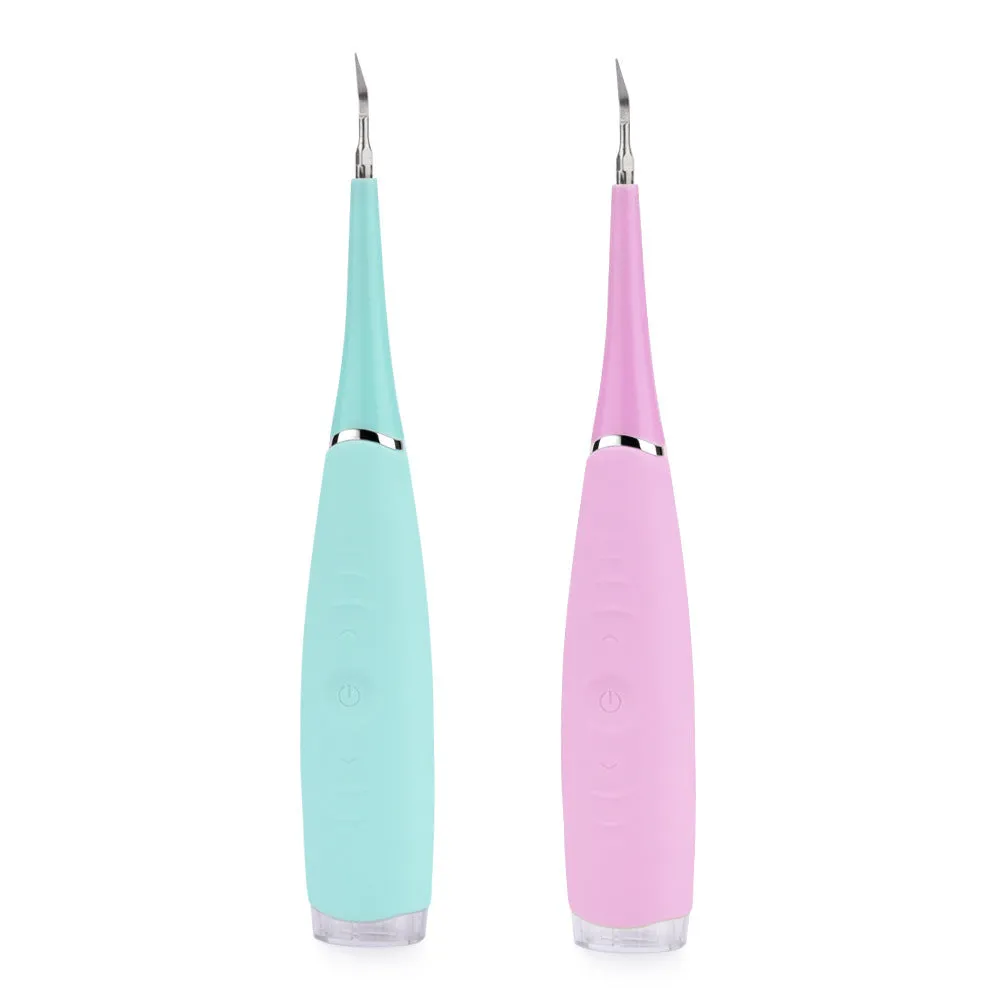 Electric dental scaler with USB rechargeable base, pink colour, compact design for home calculus removal