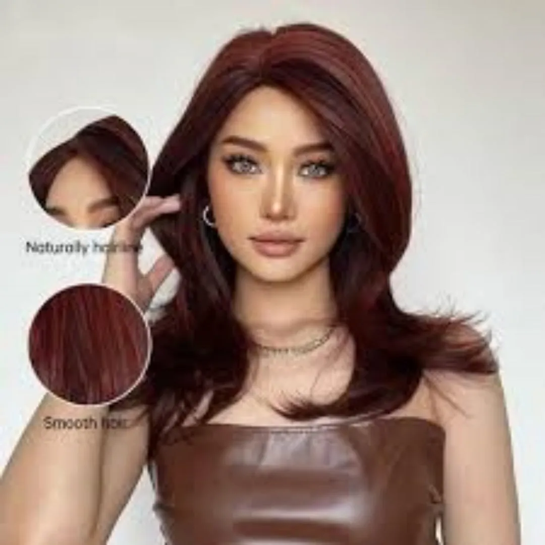 Mid-length curly synthetic wig with long bangs in a platinum gradient colour