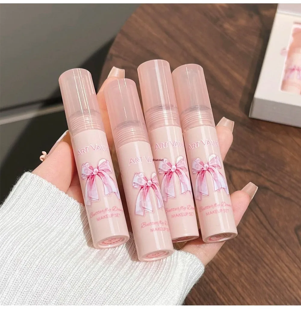 Butterfly Box pink makeup set with four matte lip muds, powder blusher, and necklace