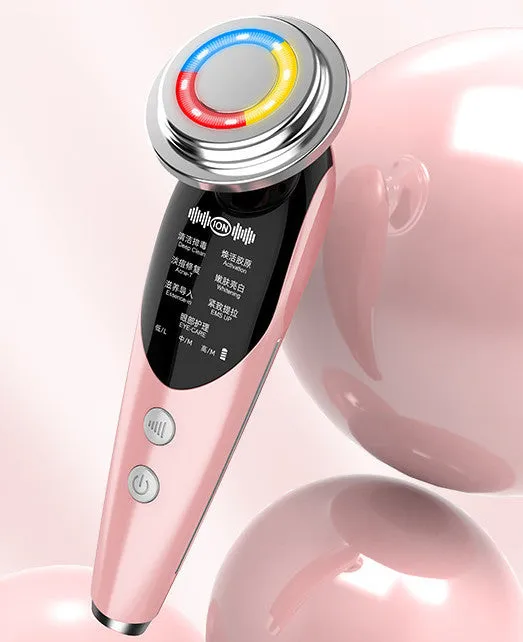 Seven-mode EMS iontophoresis beauty instrument in pink with USB charging cable