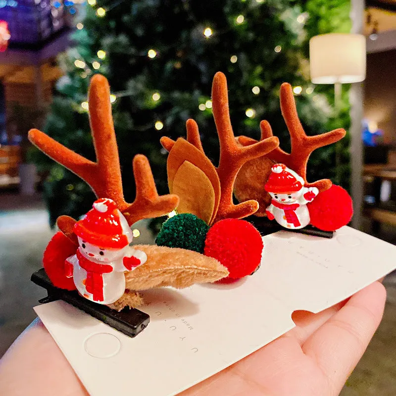 Set of plastic resin Christmas hair clips for kids with antler and snowman designs