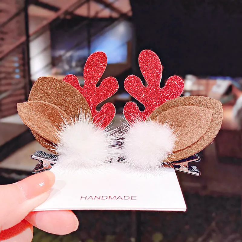 Set of plastic resin Christmas hair clips for kids with antler and snowman designs