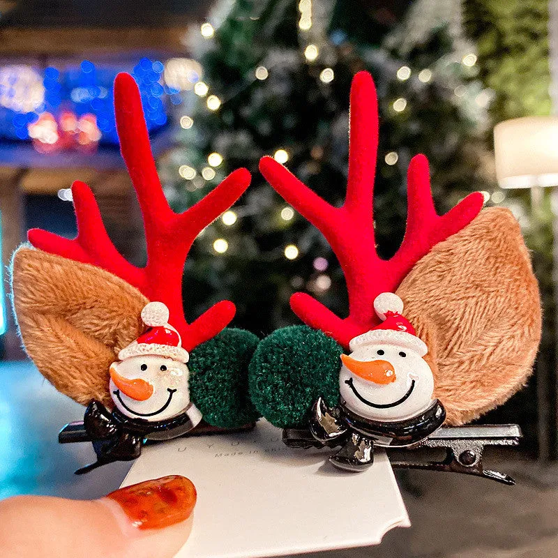 Set of plastic resin Christmas hair clips for kids with antler and snowman designs