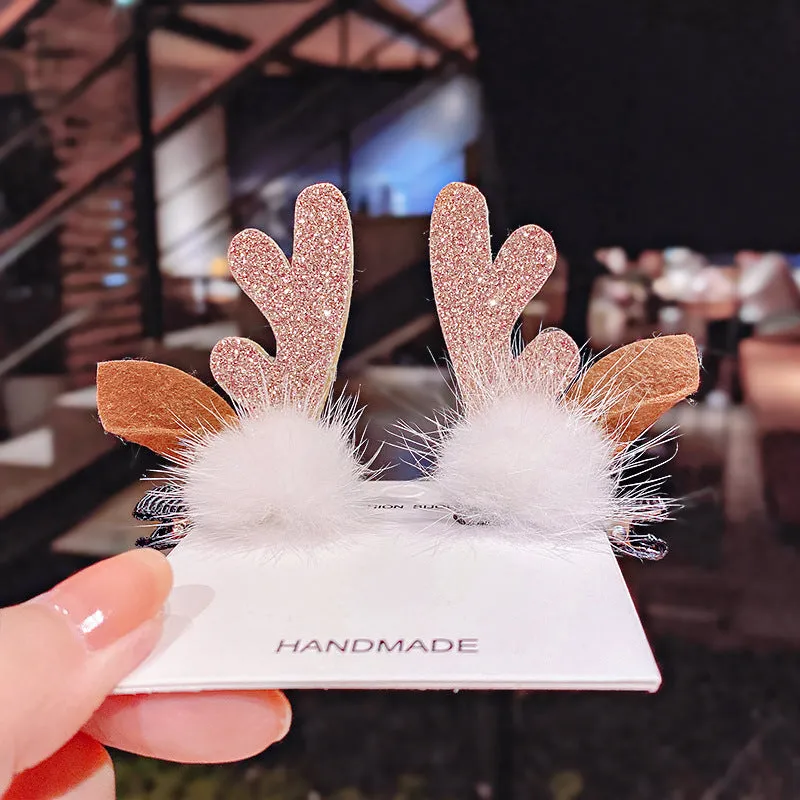 Set of plastic resin Christmas hair clips for kids with antler and snowman designs