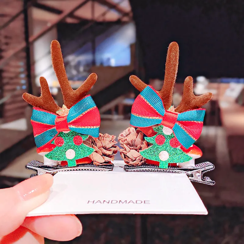 Set of plastic resin Christmas hair clips for kids with antler and snowman designs