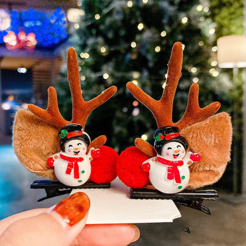 Set of plastic resin Christmas hair clips for kids with antler and snowman designs