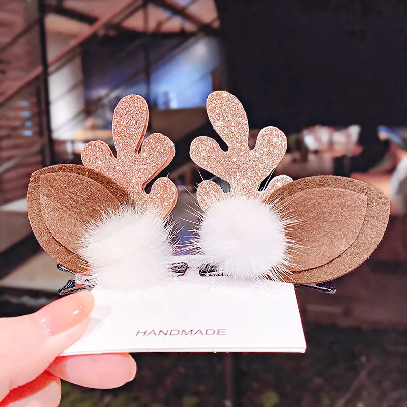 Set of plastic resin Christmas hair clips for kids with antler and snowman designs