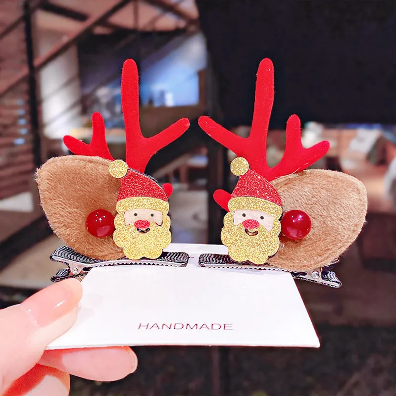 Set of plastic resin Christmas hair clips for kids with antler and snowman designs