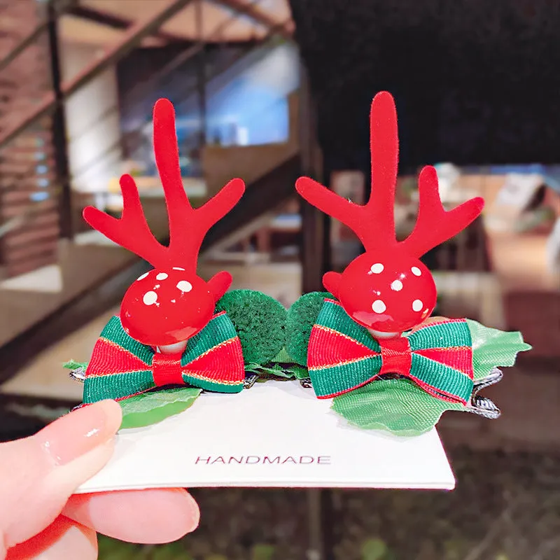 Set of plastic resin Christmas hair clips for kids with antler and snowman designs
