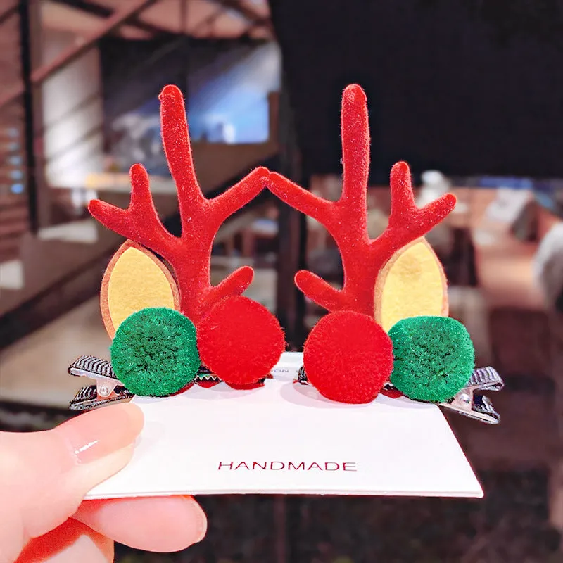 Set of plastic resin Christmas hair clips for kids with antler and snowman designs