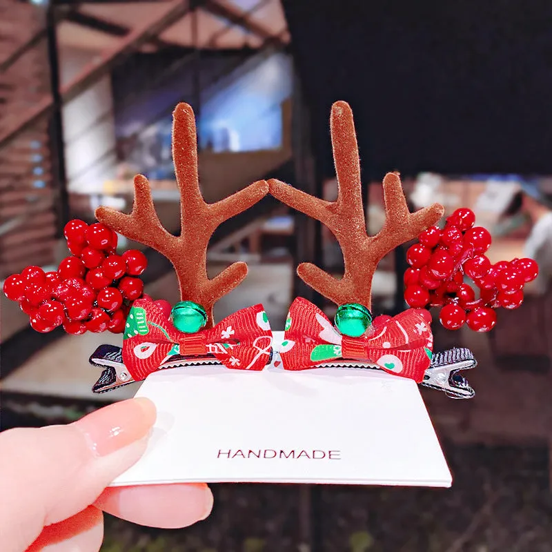 Set of plastic resin Christmas hair clips for kids with antler and snowman designs
