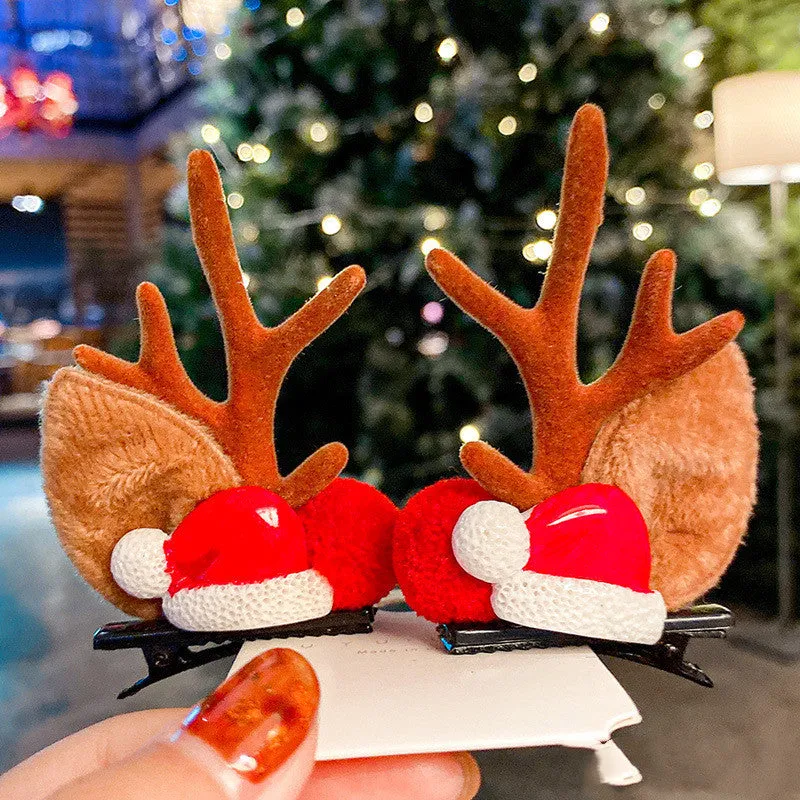 Set of plastic resin Christmas hair clips for kids with antler and snowman designs
