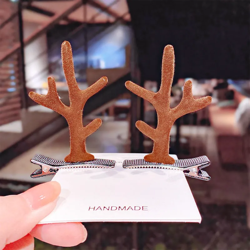 Set of plastic resin Christmas hair clips for kids with antler and snowman designs