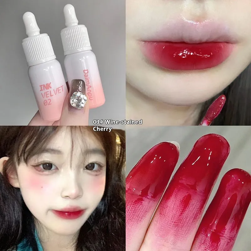 Mirror Lip Lacquer tube in moisturising formula with non-stick cup finish showing four colour options