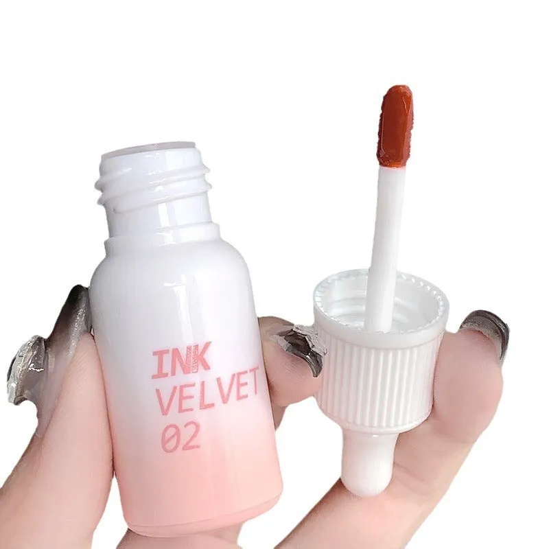Mirror Lip Lacquer tube in moisturising formula with non-stick cup finish showing four colour options