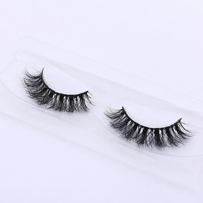 Handmade 3D mink full strip false eyelashes in style A01 against a white background