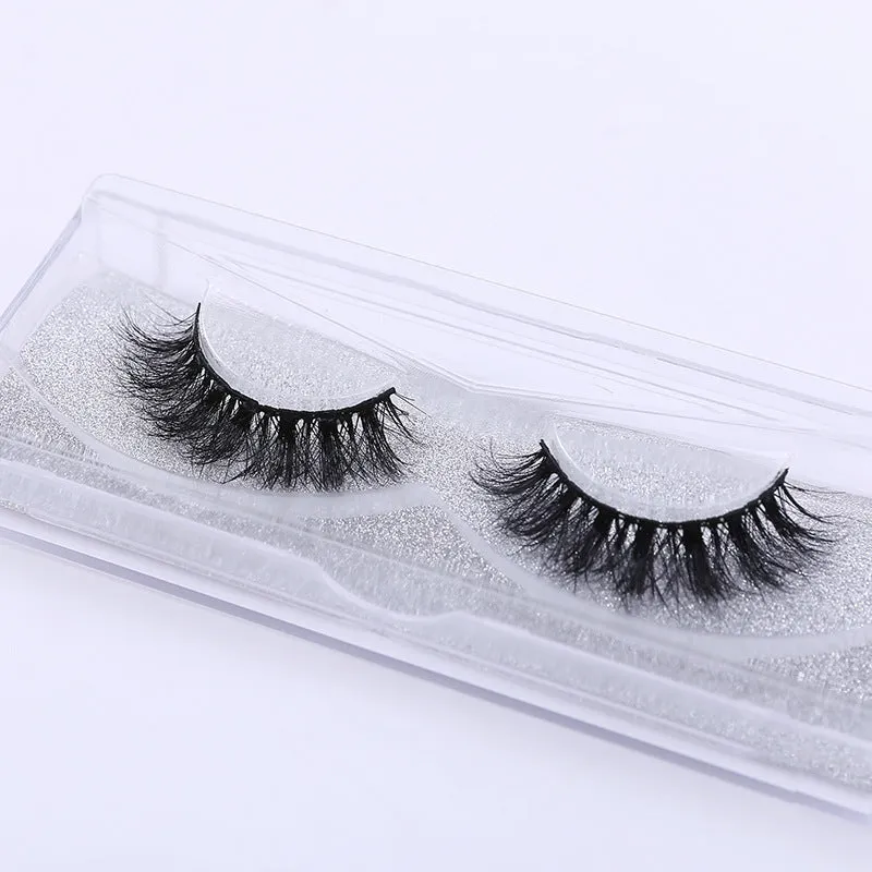 Handmade 3D mink full strip false eyelashes in style A01 against a white background