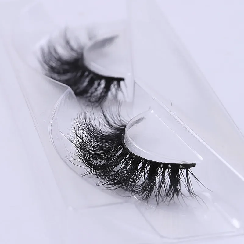 Handmade 3D mink full strip false eyelashes in style A01 against a white background