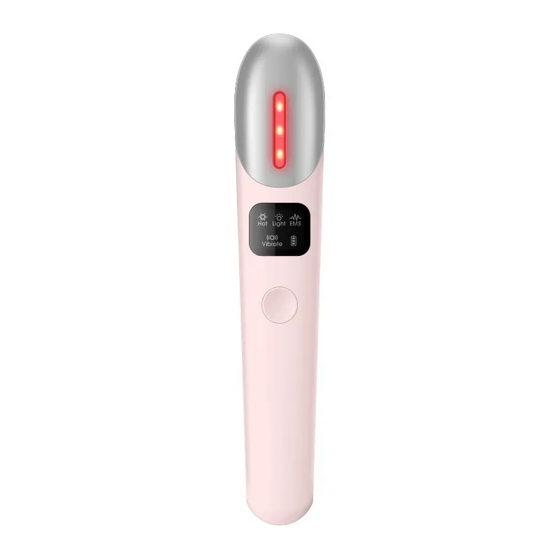 Pink EMS eye massager with micro electric current and heating for eye care, resting on a white surface