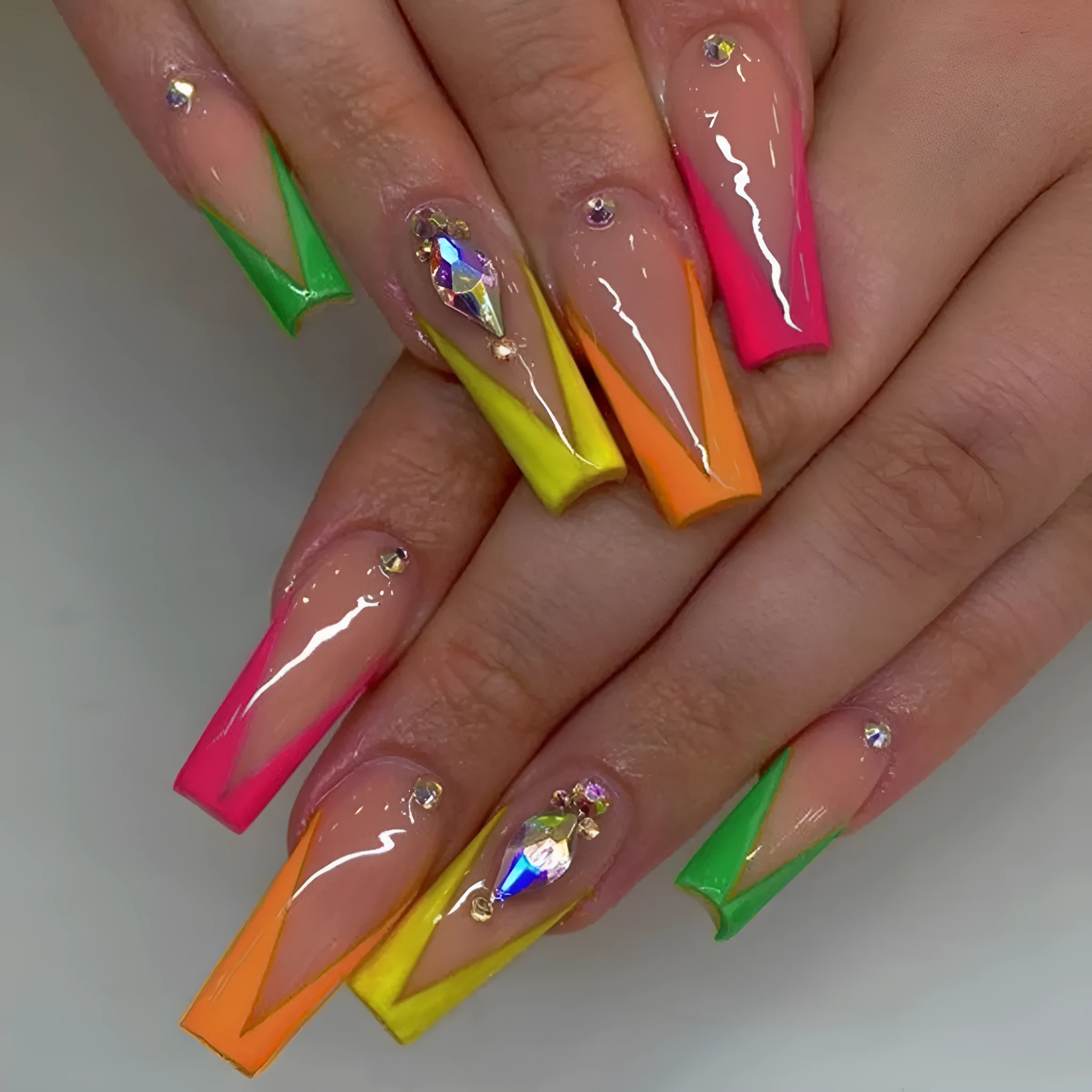 Set of detachable nail tips in diamond colour with cartoon love cross heart pattern, jelly glue, and a filing strip.