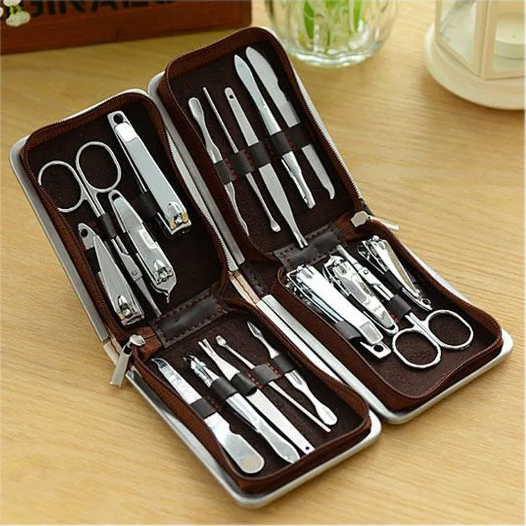 Stainless steel 9-piece nail clipper and manicure tool set in a compact case with random colour finish