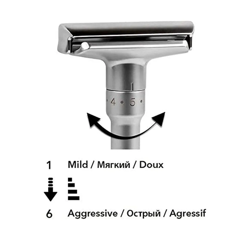 Manual old-fashioned razor with stainless steel blade and zinc alloy handle in black finish on a neutral background