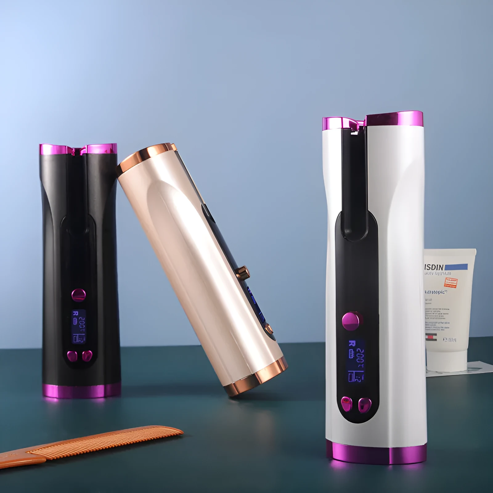 Fully automatic USB cordless curling iron in pink with 3 temperature settings, compact 190x60x50mm