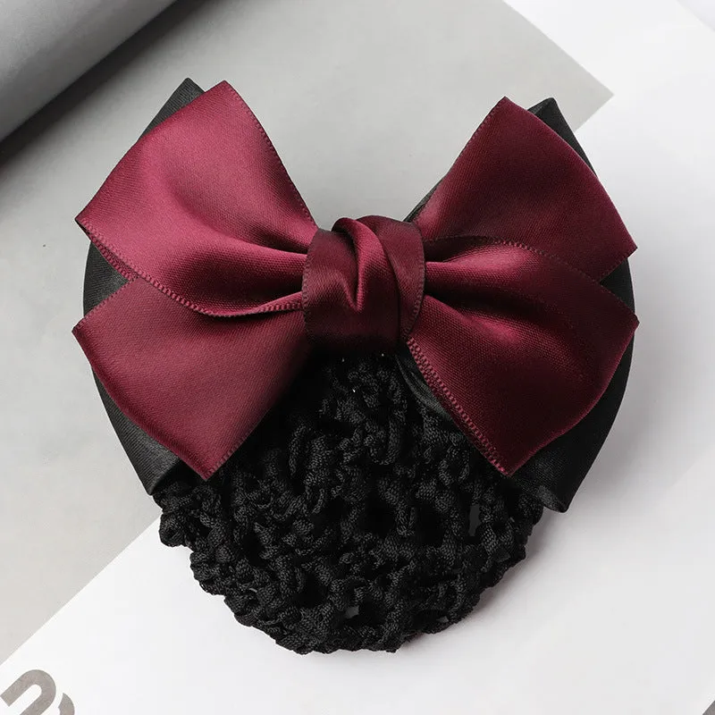Professional hair clip ornament with a bow and net design on a hair net bag.