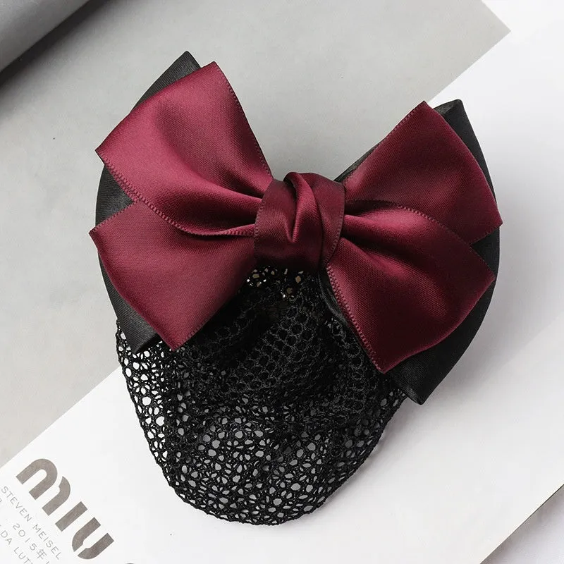 Professional hair clip ornament with a bow and net design on a hair net bag.