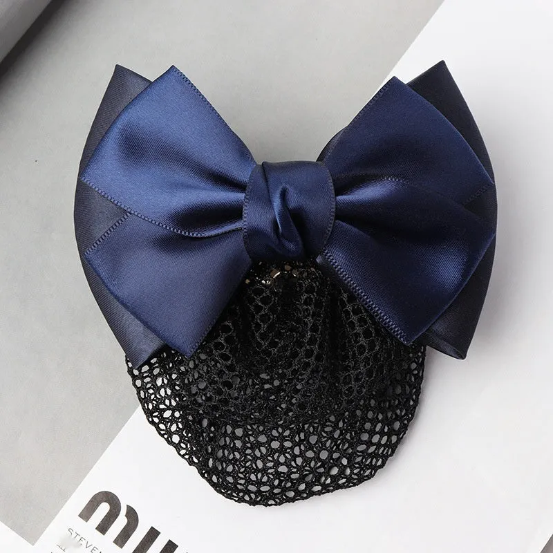 Professional hair clip ornament with a bow and net design on a hair net bag.