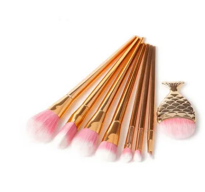 12 piece makeup brush set with nylon bristles, plastic long rod handles, mermaid and diamond design in rose gold