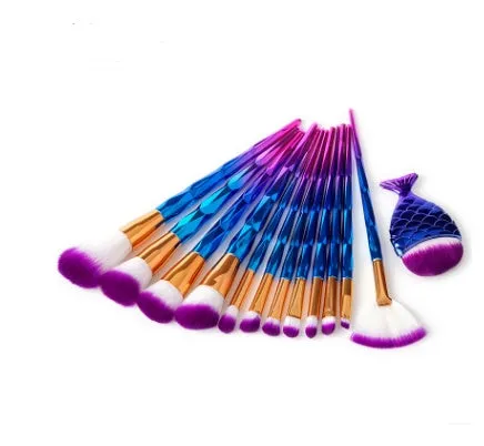 12 piece makeup brush set with nylon bristles, plastic long rod handles, mermaid and diamond design in rose gold