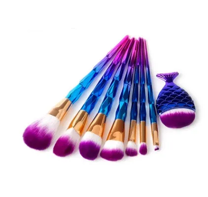 12 piece makeup brush set with nylon bristles, plastic long rod handles, mermaid and diamond design in rose gold