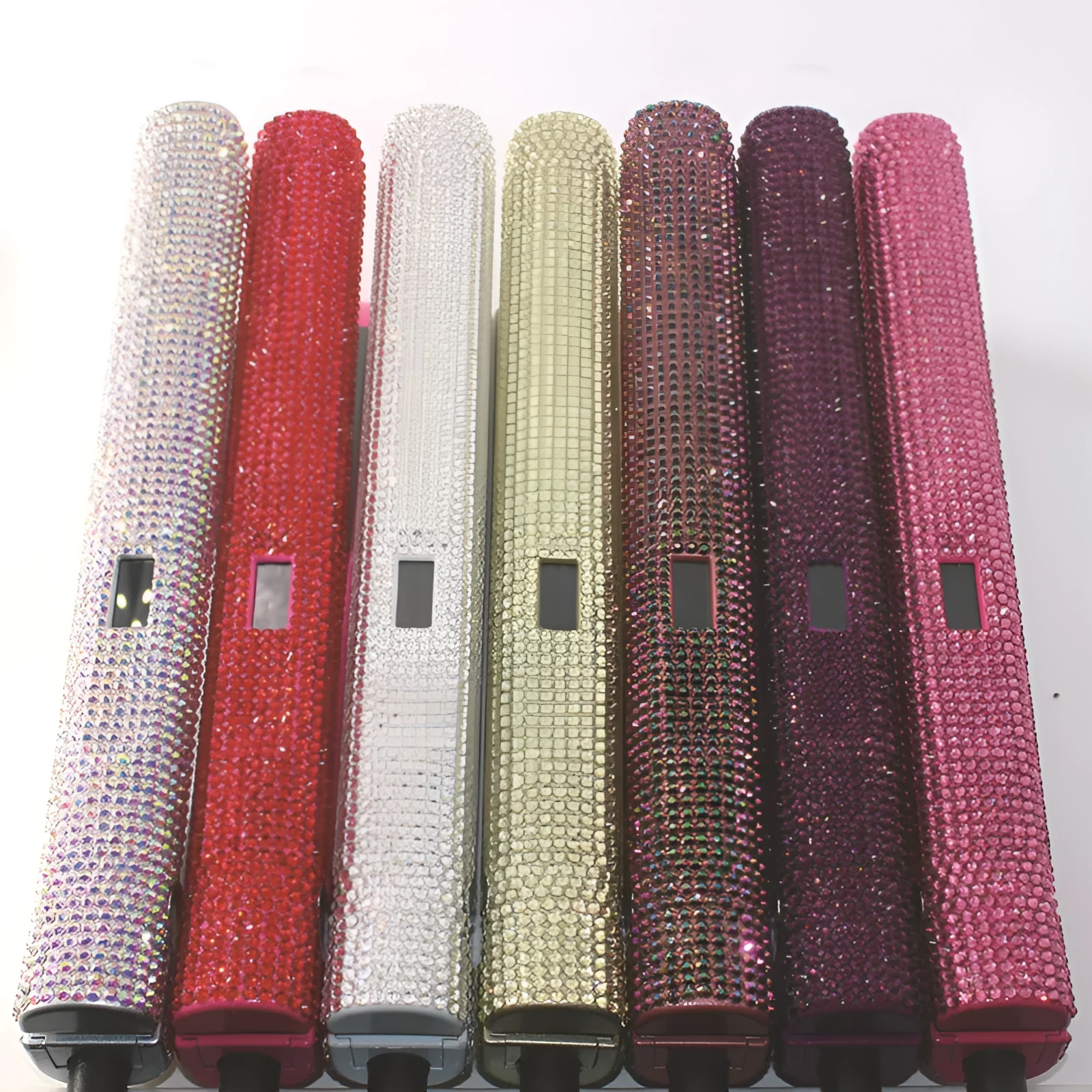 Electric hair straightener with diamond-studded plates and tourmaline ceramic heat conductor in black