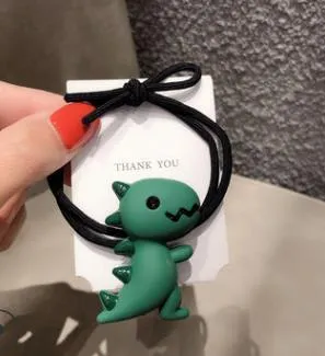 Animal cartoon hair accessories with crocodile dinosaur and frog designs in plastic resin material for women