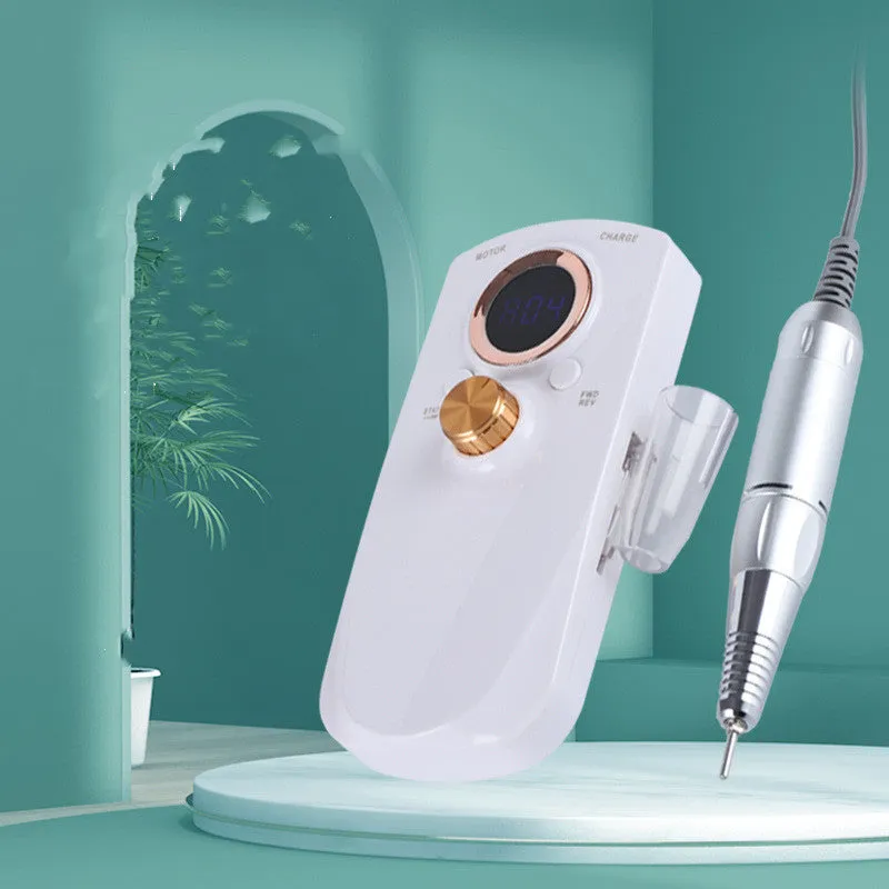 White rechargeable nail polisher with acrylic body, low noise control buttons, and EU plug for portable at-home nail grooming
