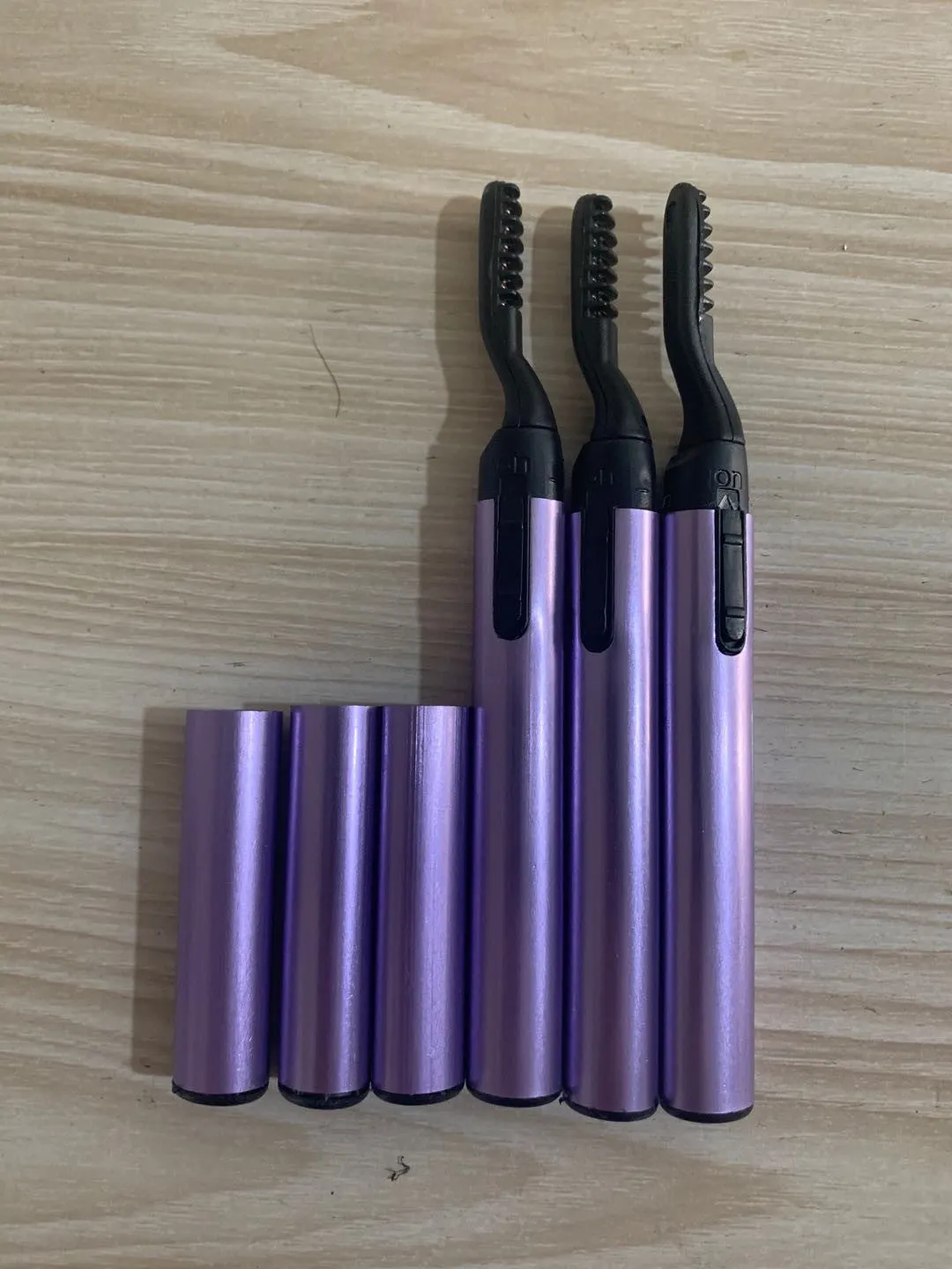 Mini portable electric heating eyelash curler in silver blue purple pink black ABS material 19.5cm long