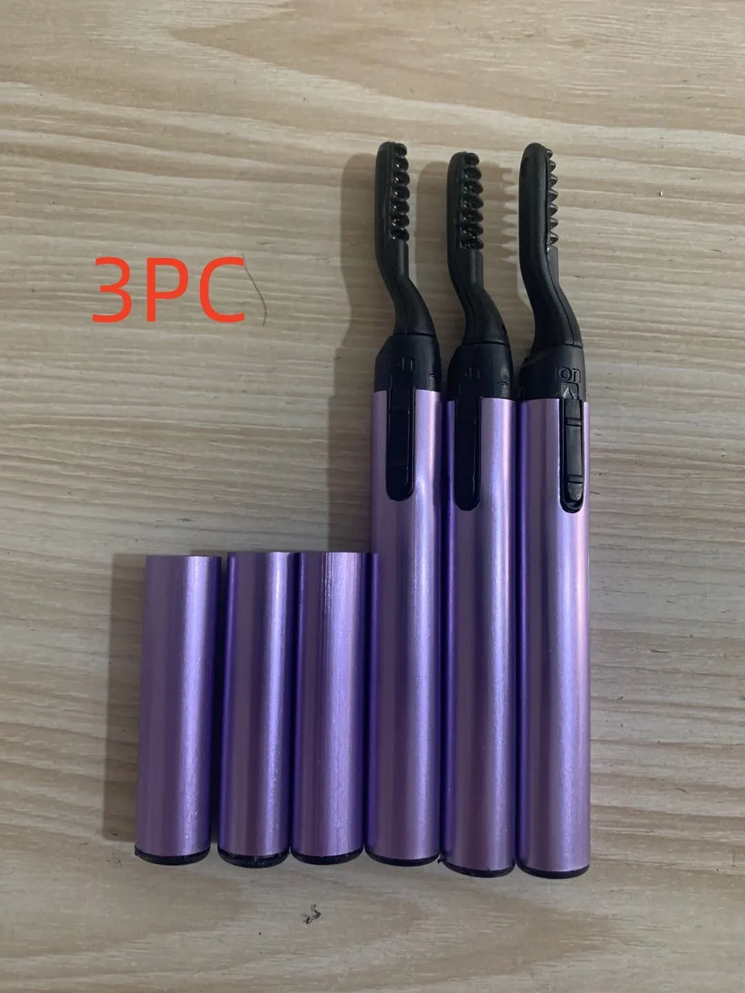 Mini portable electric heating eyelash curler in silver blue purple pink black ABS material 19.5cm long