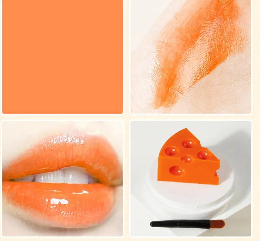 Pink cheese-shaped lip balm with Vitamin E and cream scent in open case with brush applicator