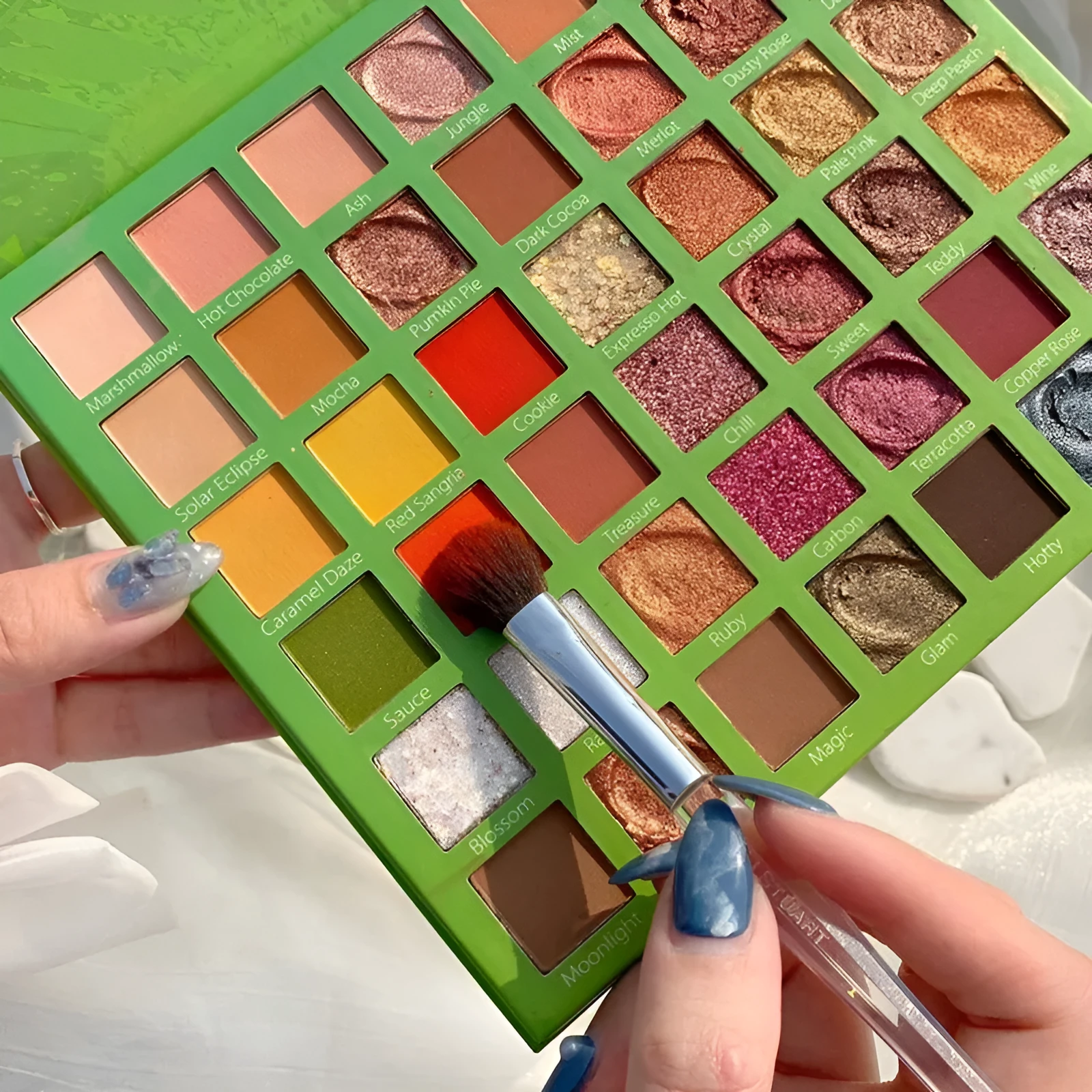 42-colour eyeshadow palette with potato and matte textures, compact case, green style, smooth shiny and matte powders