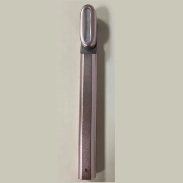 Micro current introduction eye massage instrument in green, with RF gear and USB charging cable on a white background