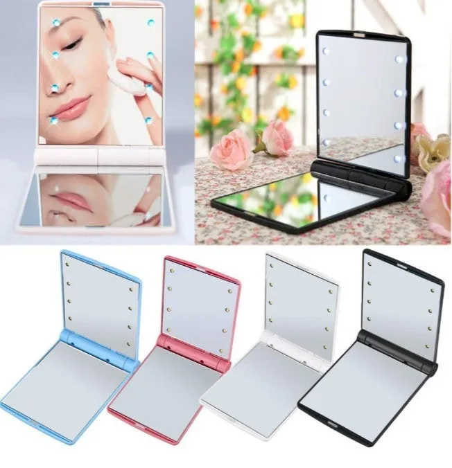 Folding LED pocket cosmetic mirror in Black, closed and open to show LEDs and compact size