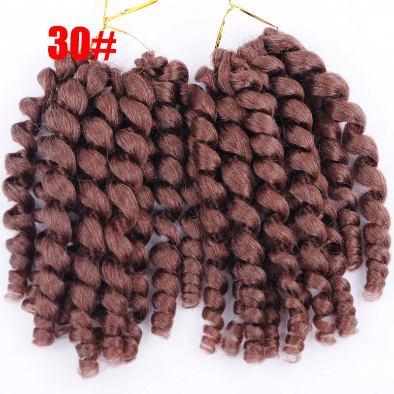 Lady's short curly wig with Risi hairline in natural colour on a mannequin head