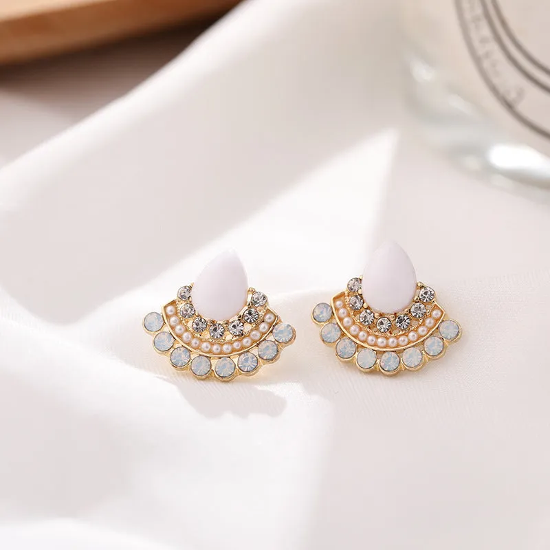 Women's silver retro fan-shaped earrings with an opal-like stone and rhinestone detailing on a geometric alloy setting.
