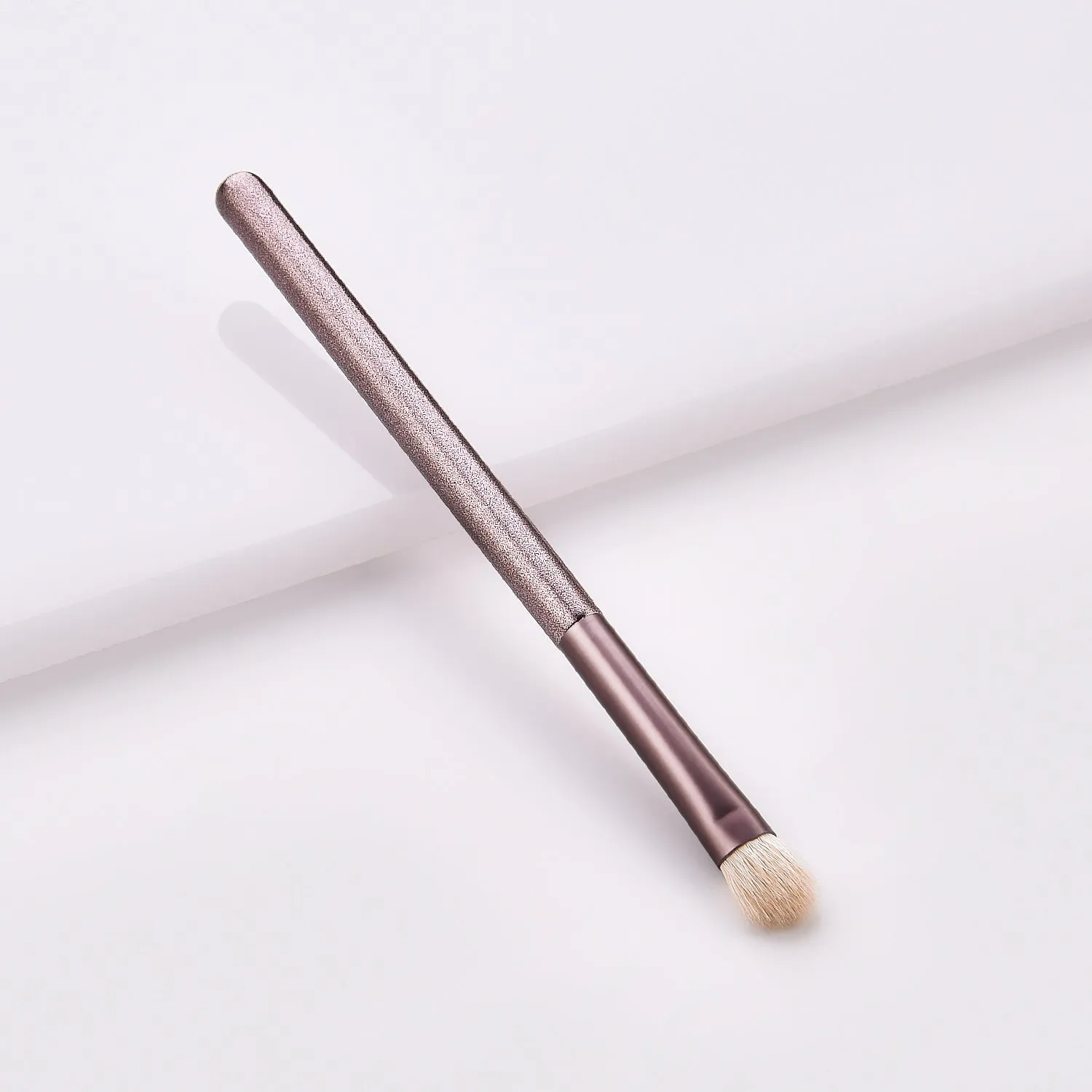 12 piece makeup brushes set with nylon bristles and wooden handles in a small grape beauty design