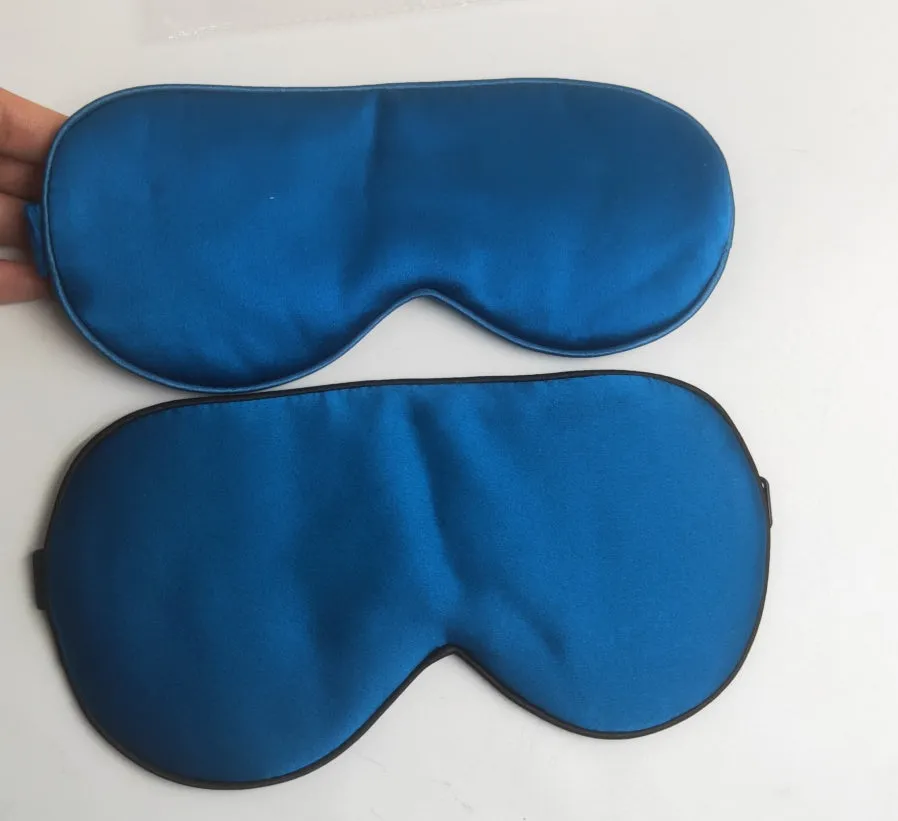 Double-sided silk eye mask in multiple colours including black, gold, green, peacock blue, pink, purple, silver