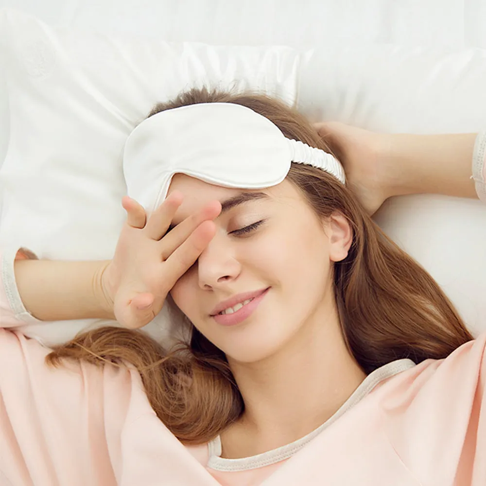 Double-sided silk eye mask in multiple colours including black, gold, green, peacock blue, pink, purple, silver