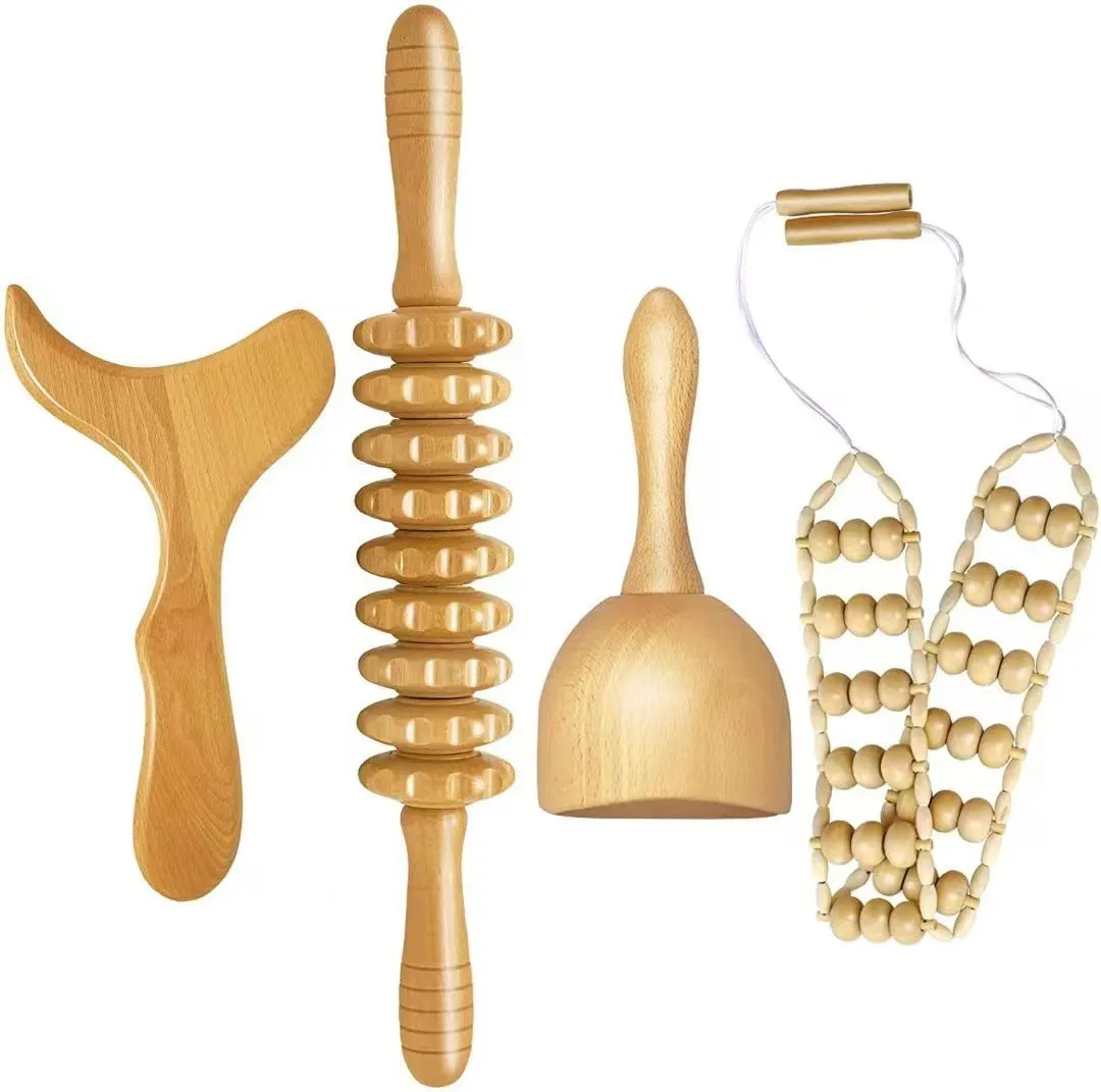 Set of three birch wood anti-cellulite massage hand rollers on a white background